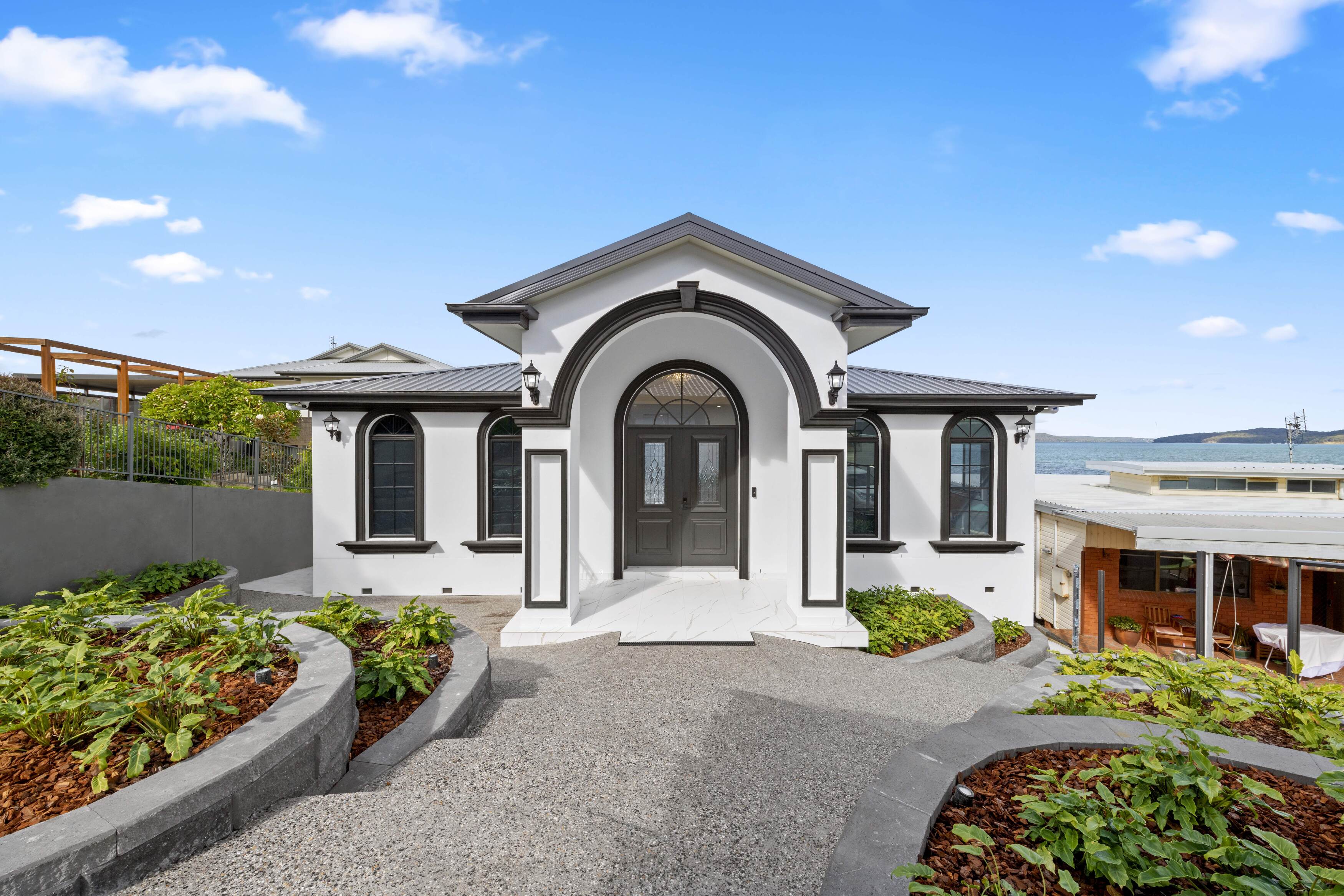 Unique Tullipan custom facade to suit owners design requirements Lake Macquarie waterfront 